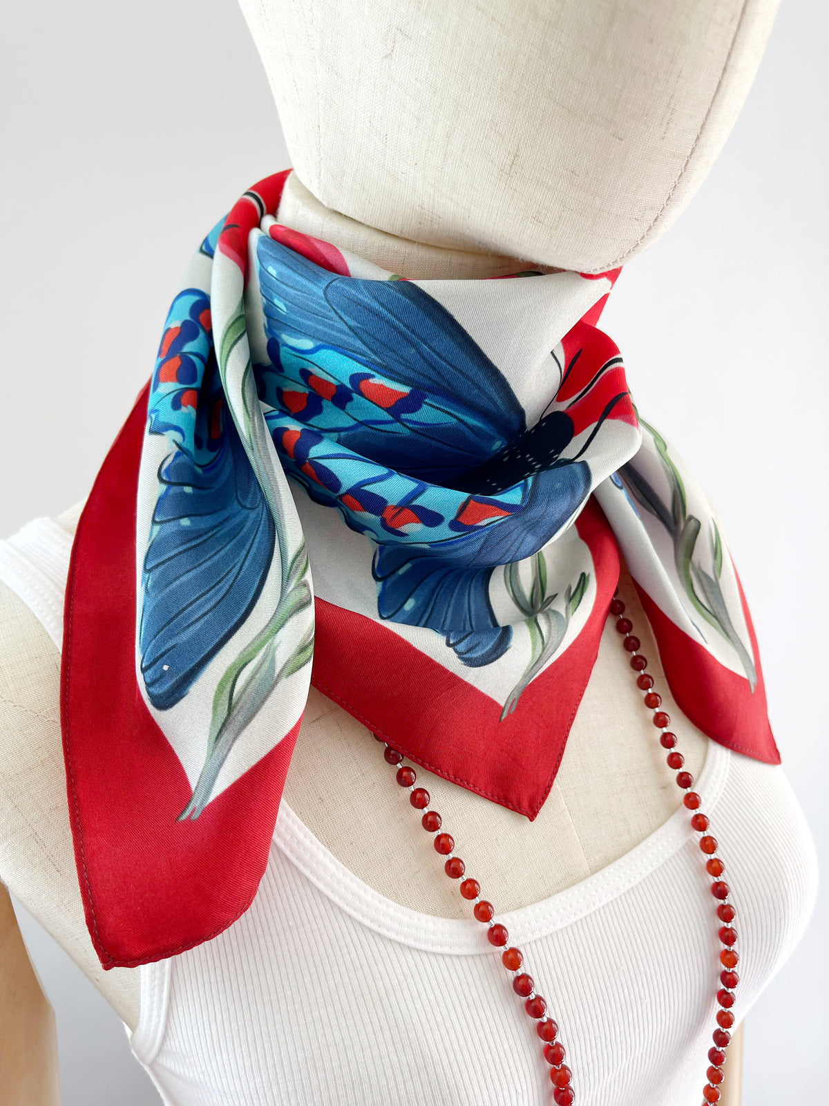 AE. Aqua Butterflies with Red Flowers Four Corner Repeat Print