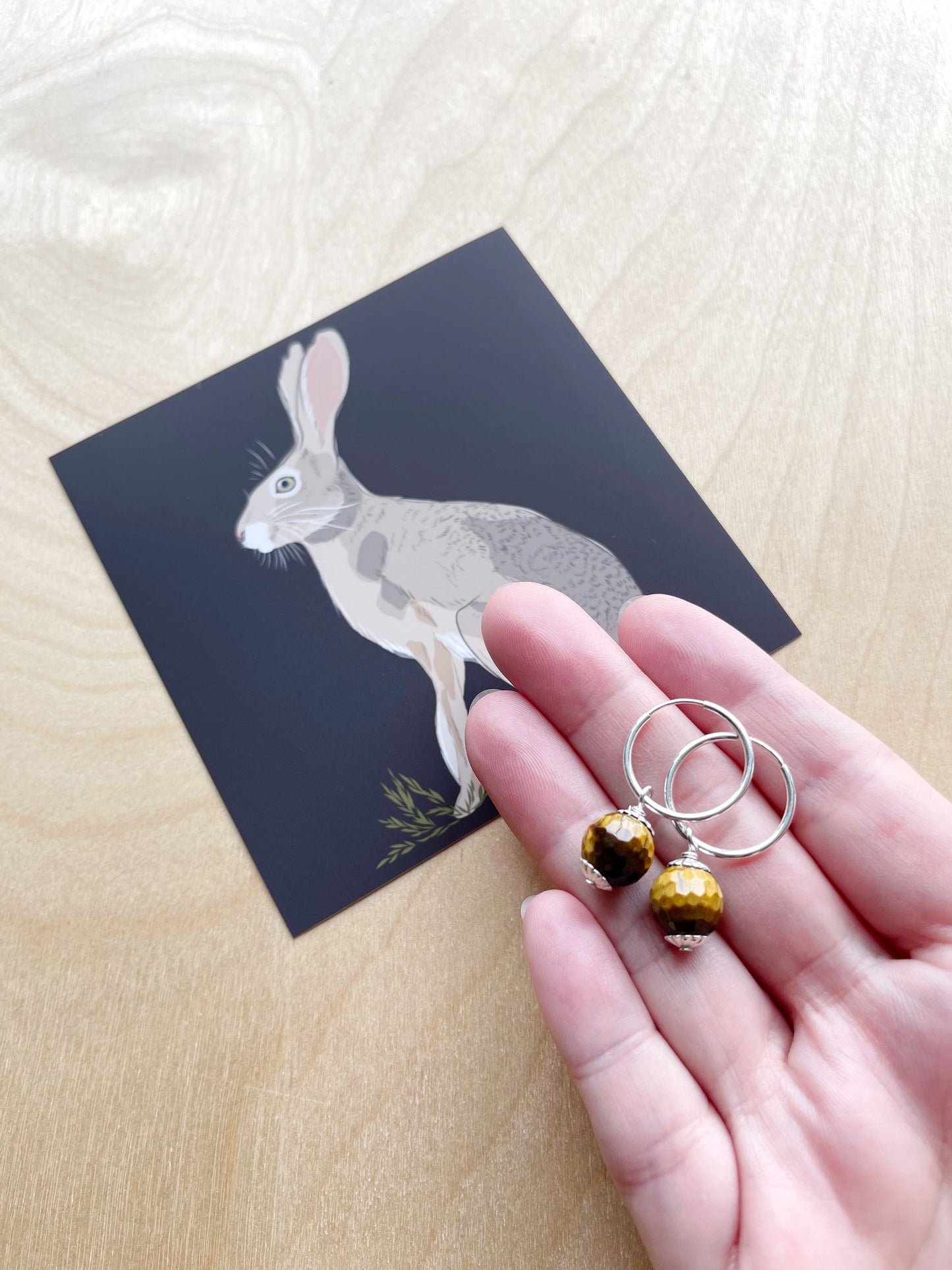 AJ. Tiger Eye dangles on sterling silver hoop earrings