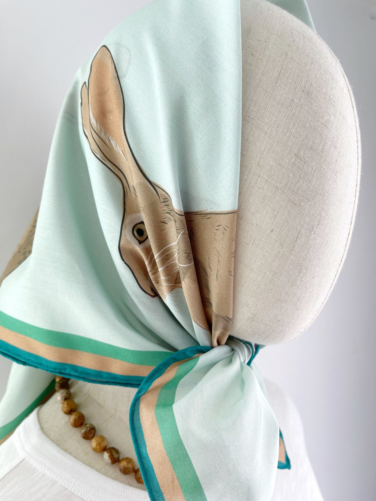 AB. Special Order Jackrabbit on a pale Robin egg blue Background Pima Cotton Lawn 26” square scarf