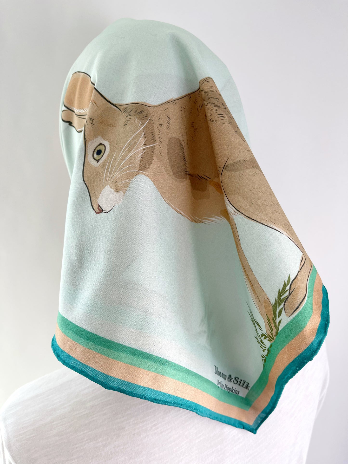 AB. Special Order Jackrabbit on a pale Robin egg blue Background Pima Cotton Lawn 26” square scarf