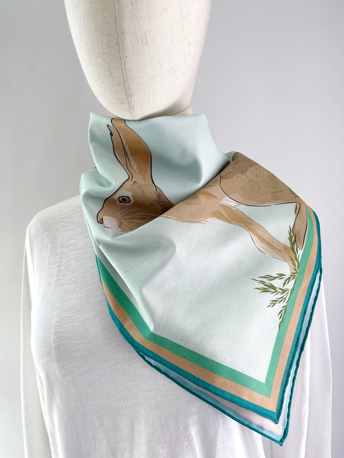 AB. Special Order Jackrabbit on a pale Robin egg blue Background Pima Cotton Lawn 26” square scarf
