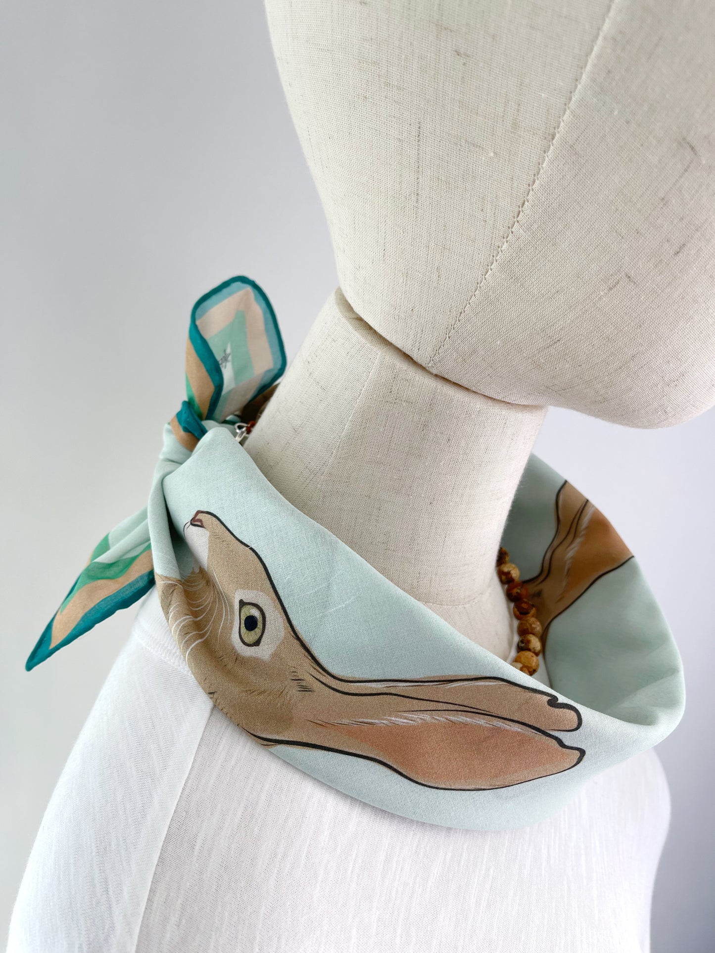 AB. Special Order Jackrabbit on a pale Robin egg blue Background Pima Cotton Lawn 26” square scarf