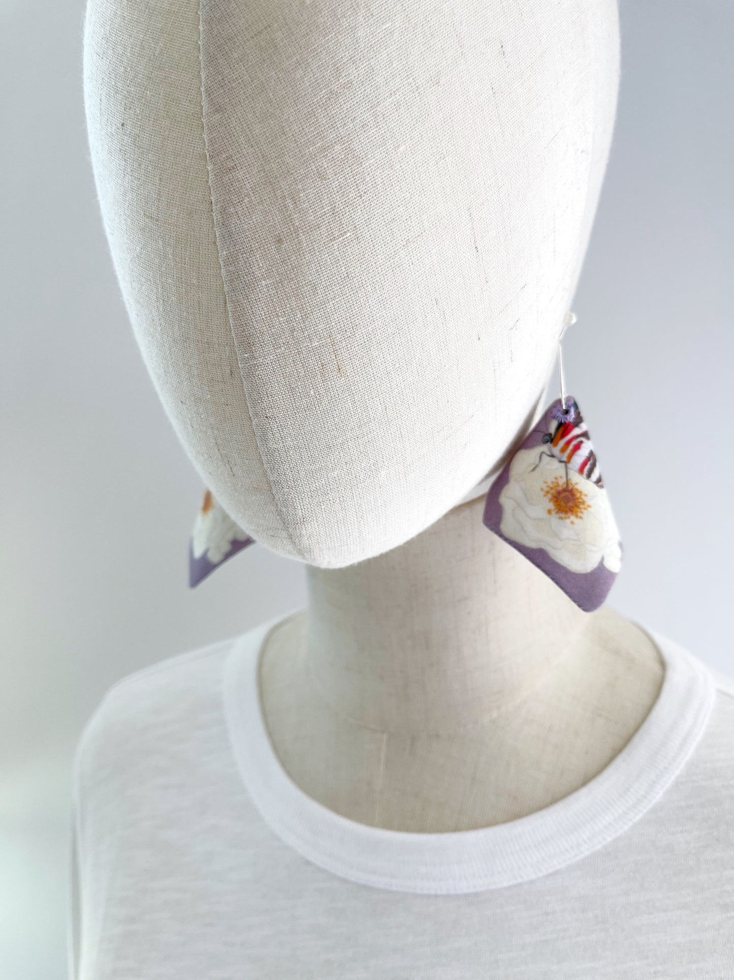AE. White Roses with butterflies on lavender large cone shaped cotton statement earrings