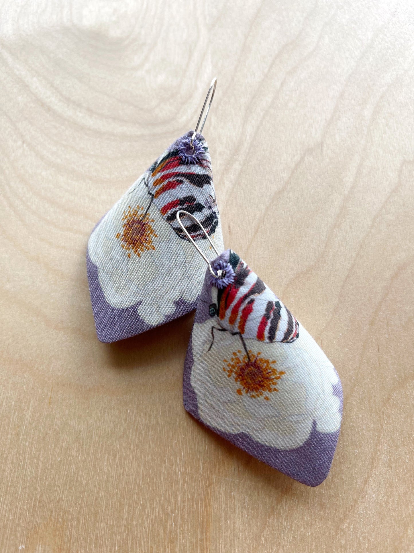 AE. White Roses with butterflies on lavender large cone shaped cotton statement earrings