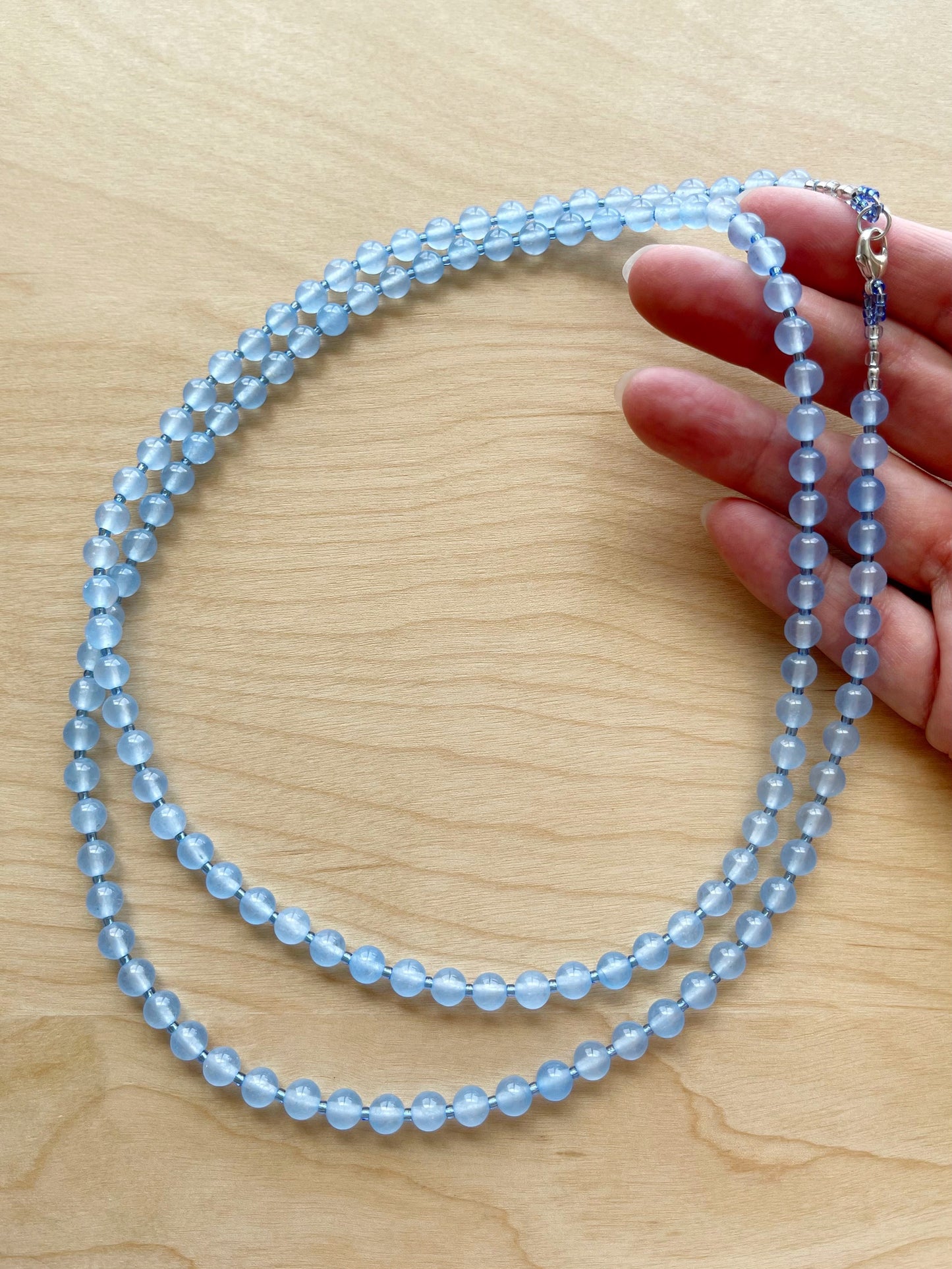 B. 38” Long & double-able necklace of Blue Jade