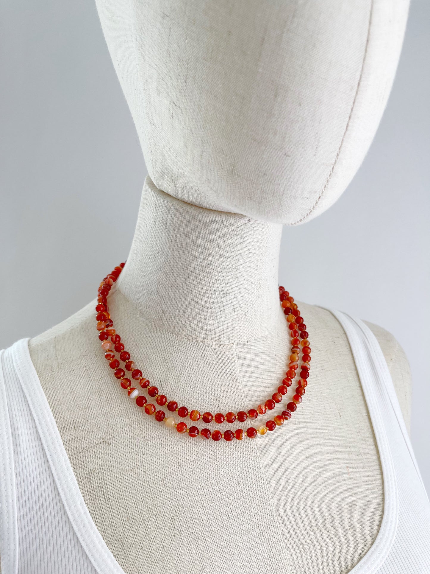 B. 38” Long & double-able necklace of Red Striped Agate