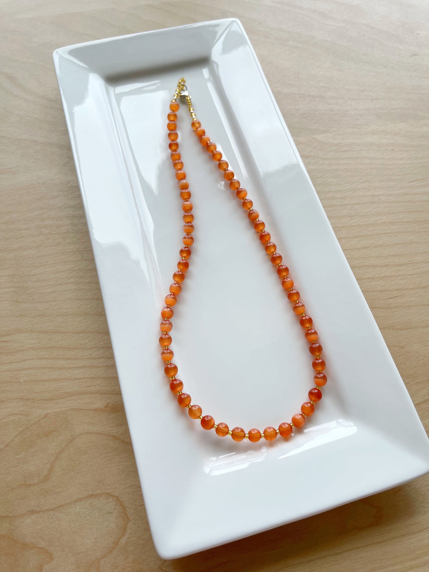 BA. Orange Cat’s Eye necklace 6mm 18”