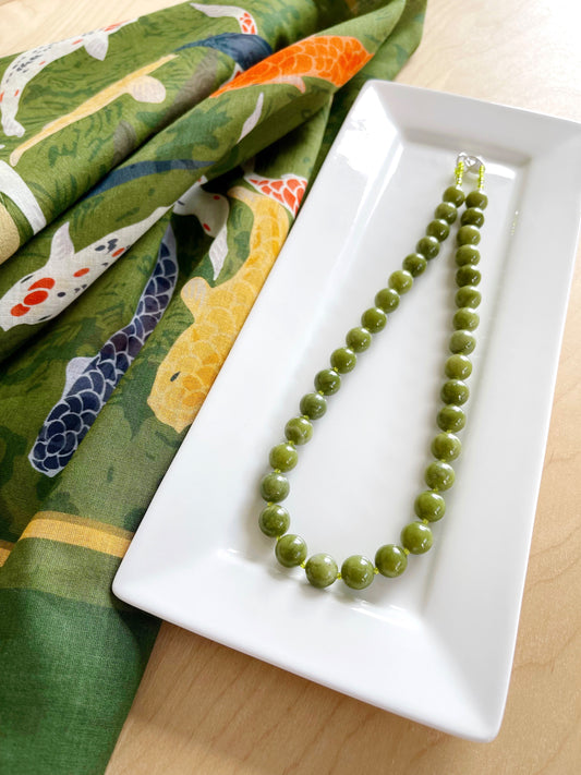 AC. Necklace of Chinese Jade with a sterling silver lobster claw clasp